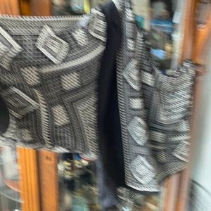 Bcbg one sleeve silk shirt with a slit on the one sleeve. Beautiful. Worn once